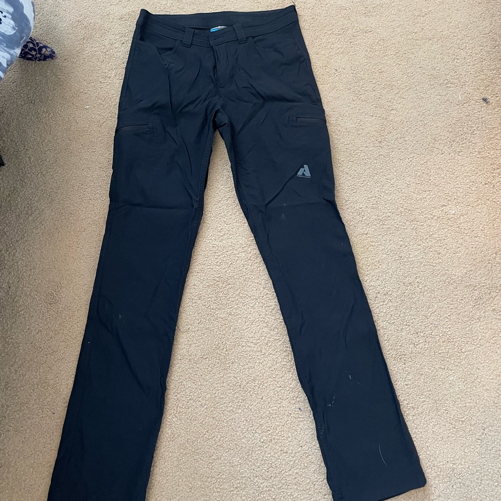 Eddie Bauer hiking pants with pockets and zippers. Never worn.